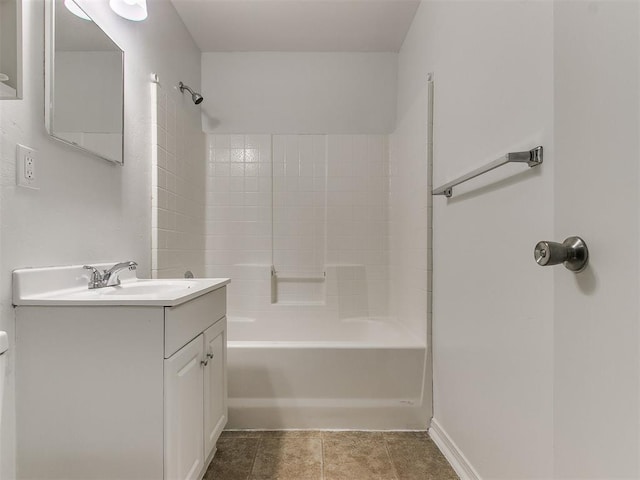 bathroom featuring vanity, bathtub / shower combination, and tile patterned flooring