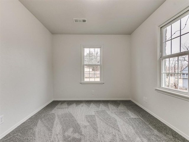 view of carpeted spare room