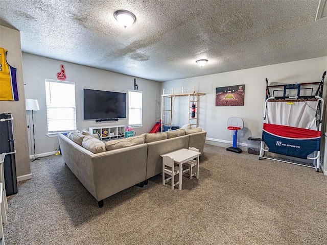 carpeted living room featuring a textured ceiling