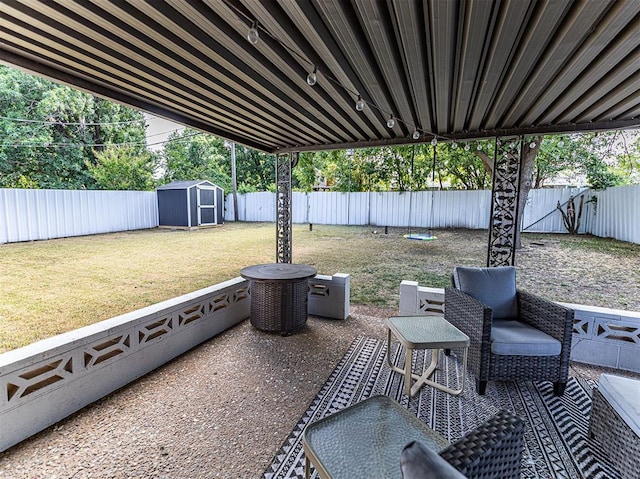 view of patio / terrace featuring a shed