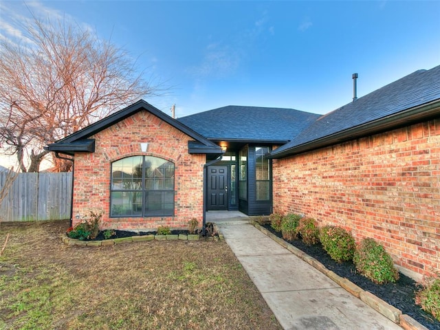 exterior space with a front lawn