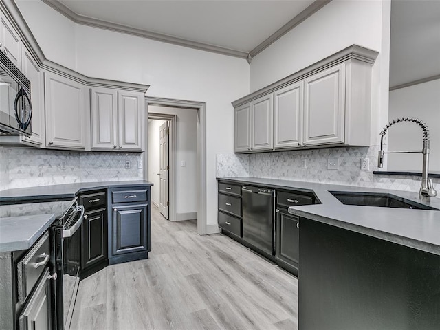 kitchen with crown molding, sink, gray cabinetry, and electric range