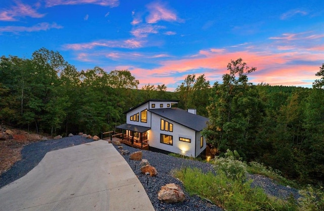 contemporary home featuring a porch