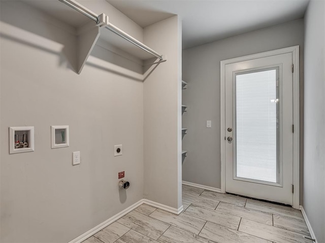 washroom with hookup for a washing machine and hookup for an electric dryer