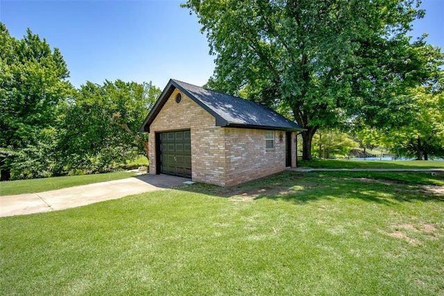 garage with a yard