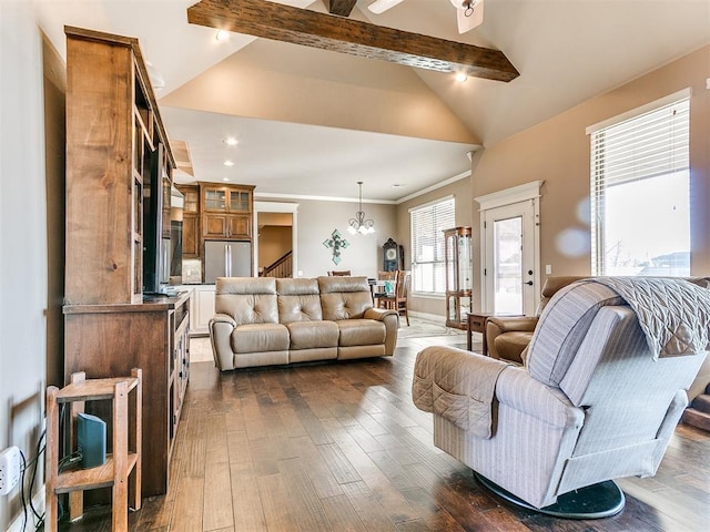 living room featuring crown molding, dark hardwood / wood-style floors, a chandelier, and vaulted ceiling with beams