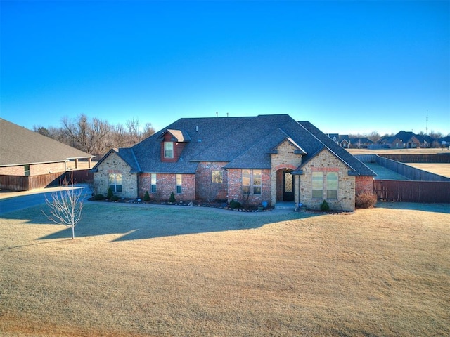 view of front of home with a front yard