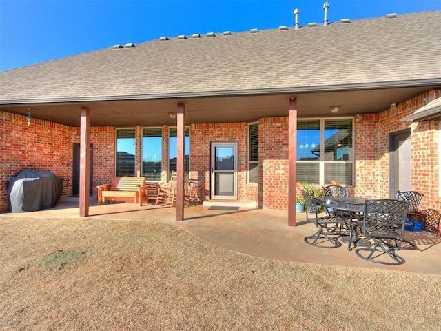 rear view of house with a patio