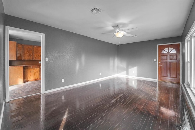 interior space featuring dark hardwood / wood-style floors and ceiling fan