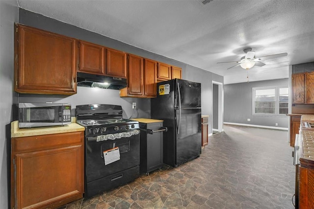 kitchen with ceiling fan and black appliances