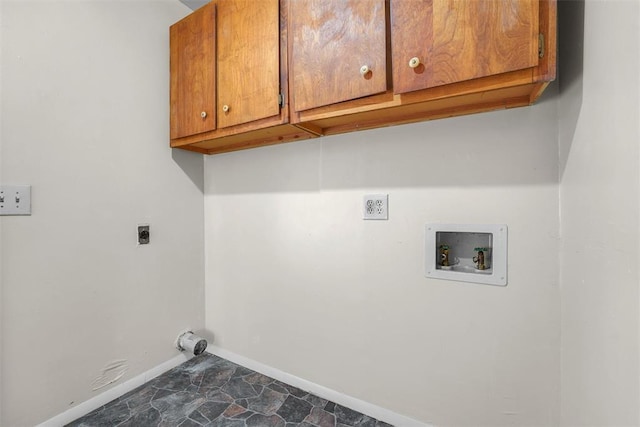 laundry area featuring hookup for a washing machine, cabinets, and hookup for an electric dryer