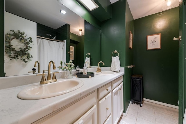 bathroom featuring vanity, tile patterned floors, and a shower with shower curtain