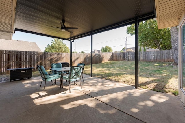 view of patio featuring ceiling fan