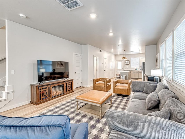 living room featuring light hardwood / wood-style flooring