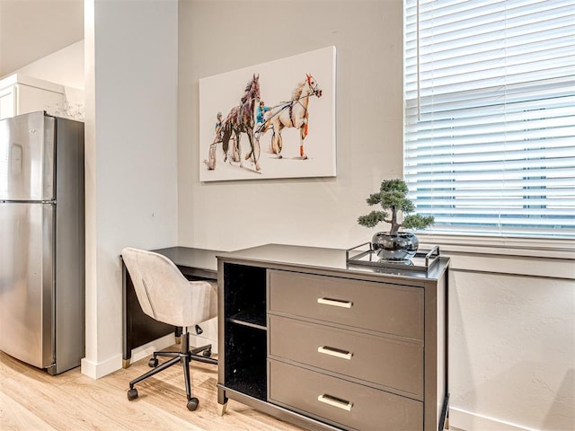 home office featuring light wood-type flooring