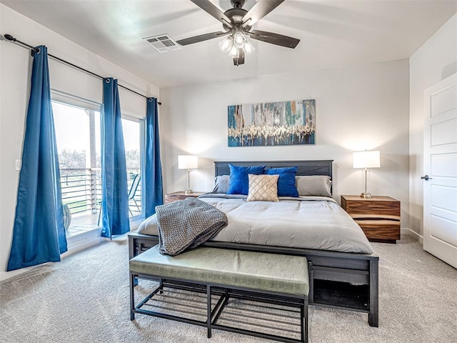 carpeted bedroom featuring ceiling fan and access to exterior