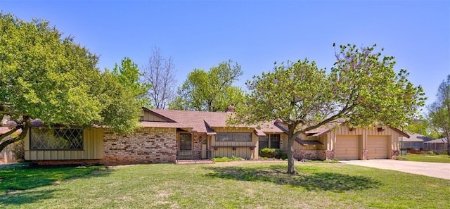 ranch-style home featuring a garage and a front yard