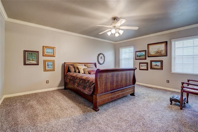 carpeted bedroom featuring crown molding and ceiling fan