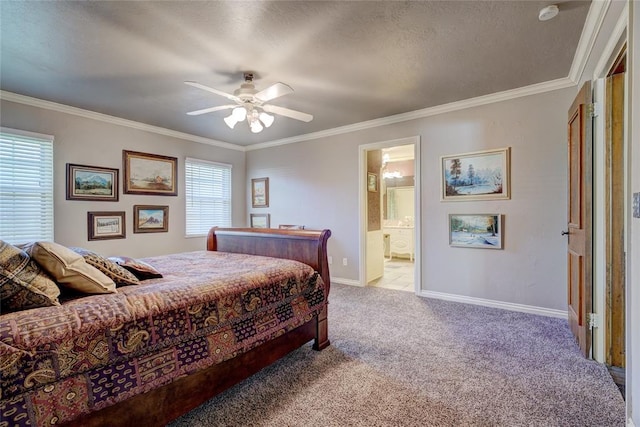 carpeted bedroom with ornamental molding, ceiling fan, and ensuite bath