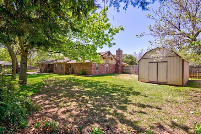 view of yard with a storage shed