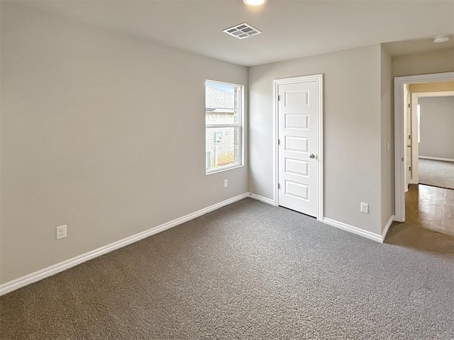 unfurnished bedroom featuring carpet