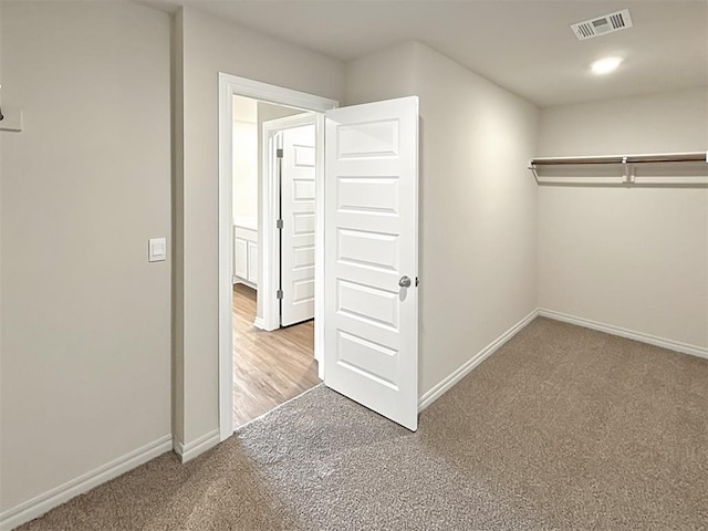 interior space featuring light colored carpet