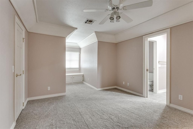 bonus room featuring light carpet and ceiling fan