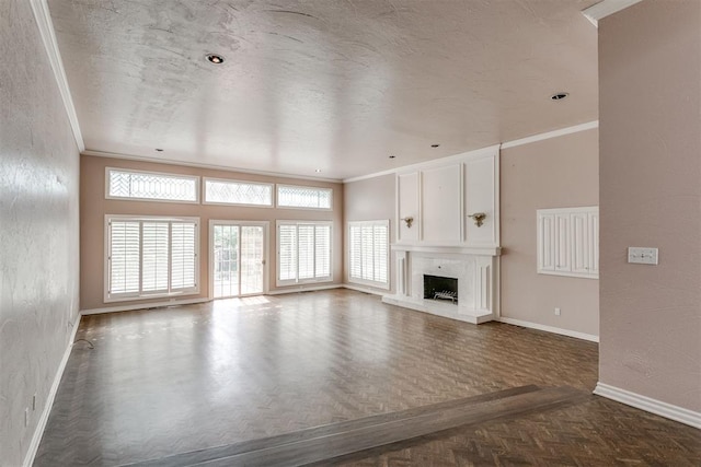 unfurnished living room with parquet floors, crown molding, and a textured ceiling