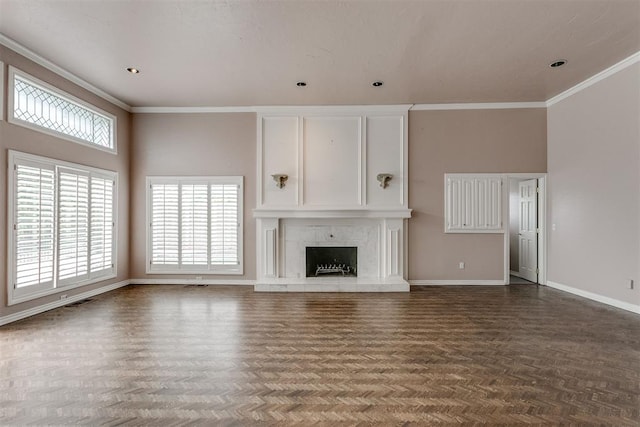 unfurnished living room featuring parquet floors, crown molding, a fireplace, and a high ceiling