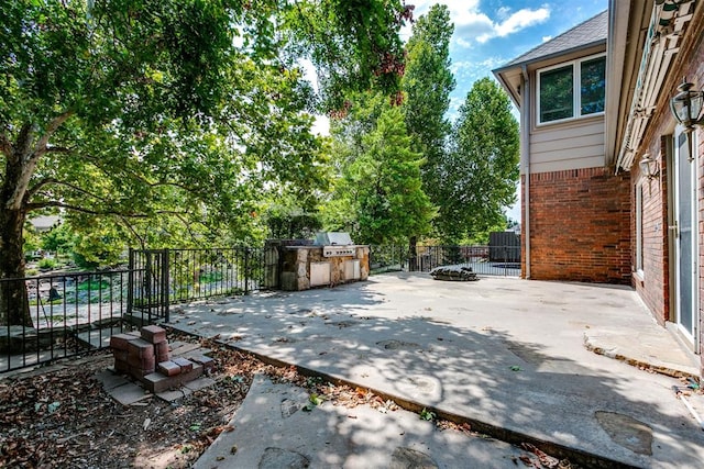 view of patio with area for grilling