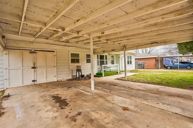 exterior space with a carport