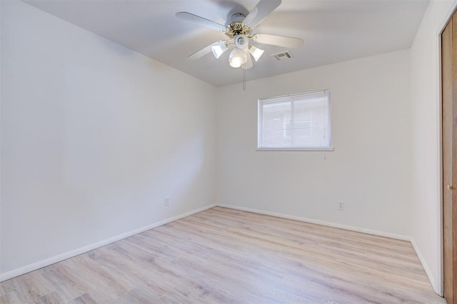 unfurnished room with ceiling fan and light hardwood / wood-style floors