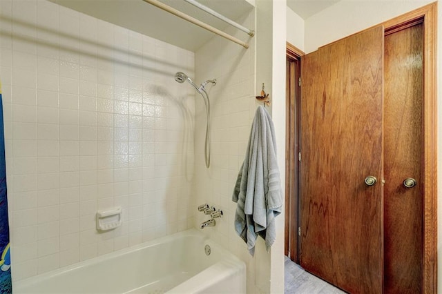 bathroom featuring shower / tub combo with curtain