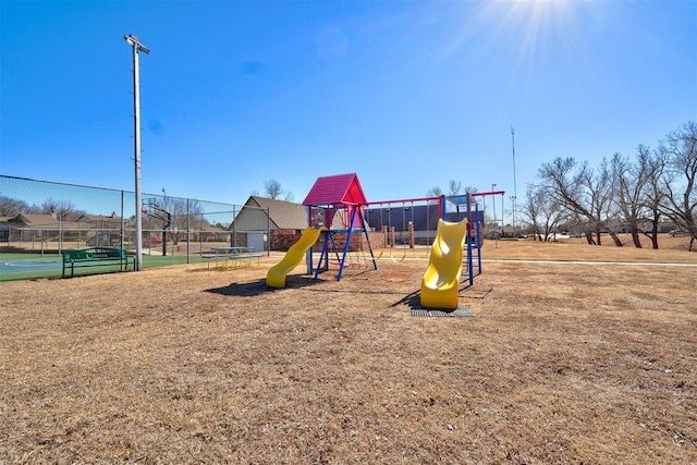 view of playground featuring tennis court