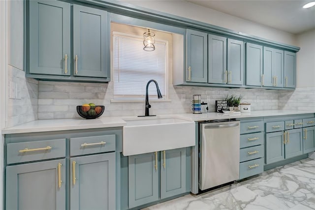 kitchen featuring sink, stainless steel dishwasher, and decorative backsplash