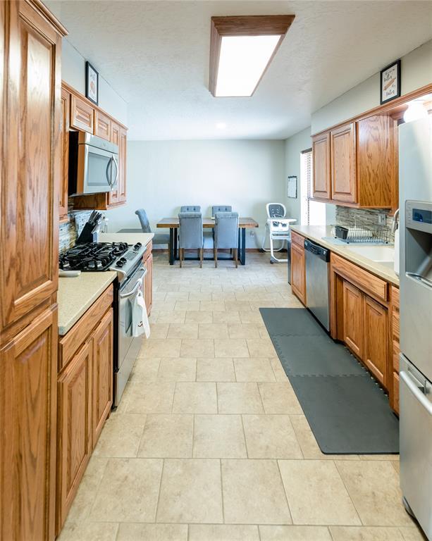 kitchen featuring stainless steel appliances and sink