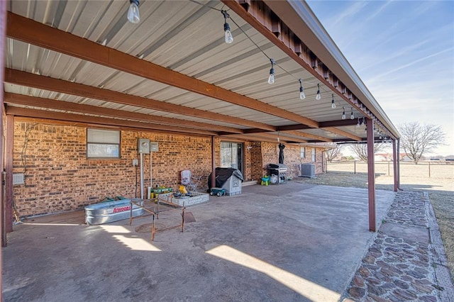 view of patio / terrace with a grill and central AC