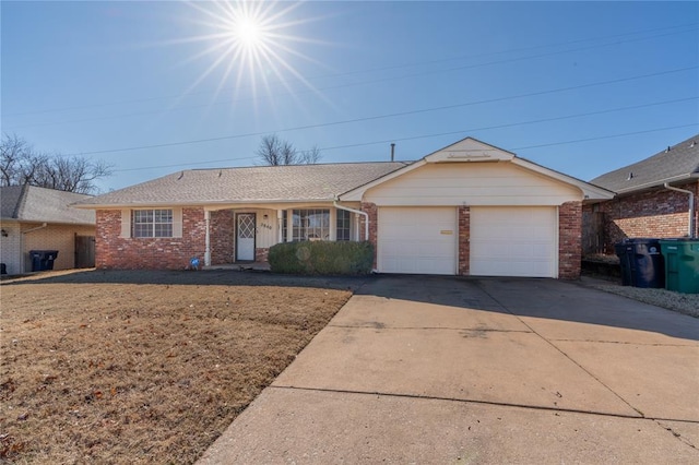 single story home with a garage and a front yard