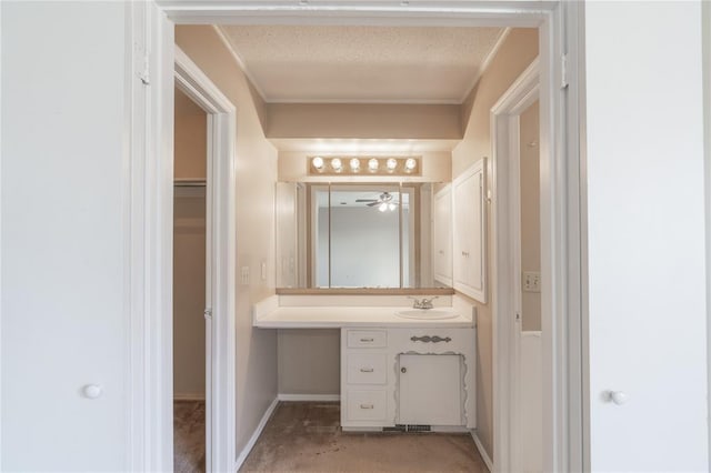 bathroom featuring vanity and a textured ceiling