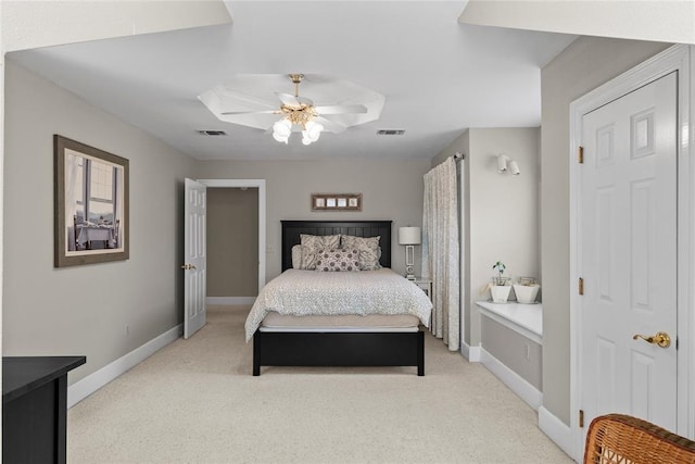 bedroom with light colored carpet and ceiling fan