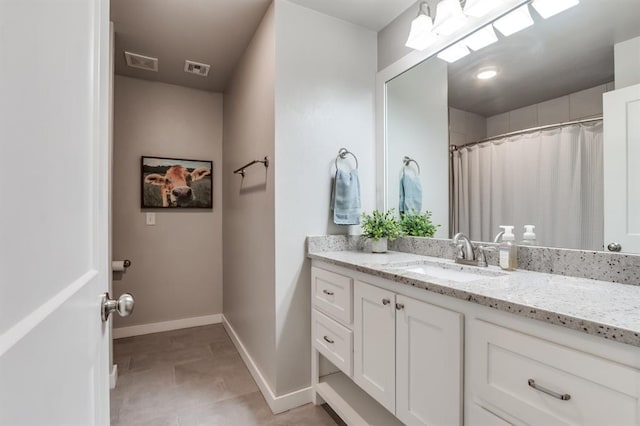 bathroom featuring vanity