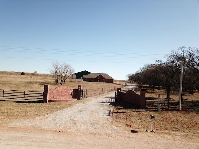 exterior space with a rural view