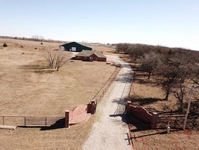 view of yard with a rural view