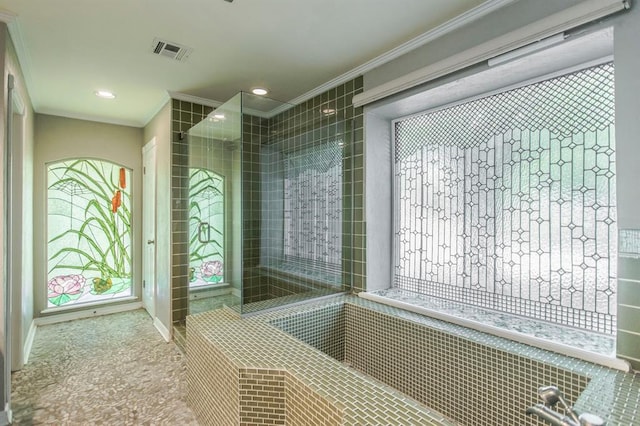 bathroom with a tile shower and ornamental molding