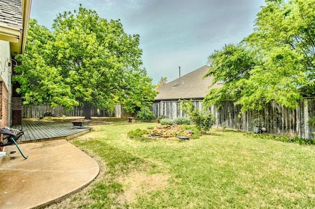 view of yard featuring a deck