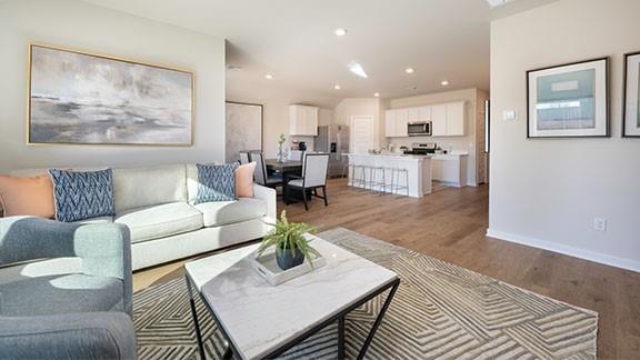 10225 NW 28th St, Yukon, OK 73099 - living room with light hardwood / wood-style floors
