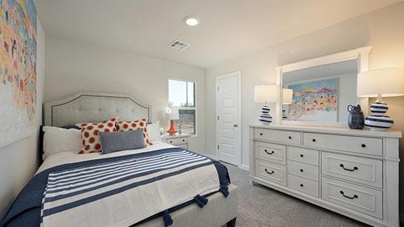 10225 NW 28th St, Yukon, OK 73099 - bedroom with light colored carpet