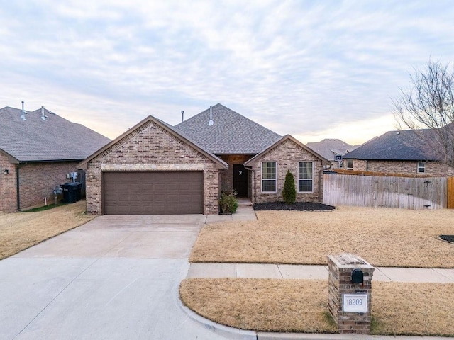 ranch-style home with a garage