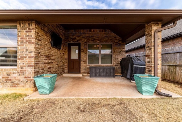 entrance to property with a patio area