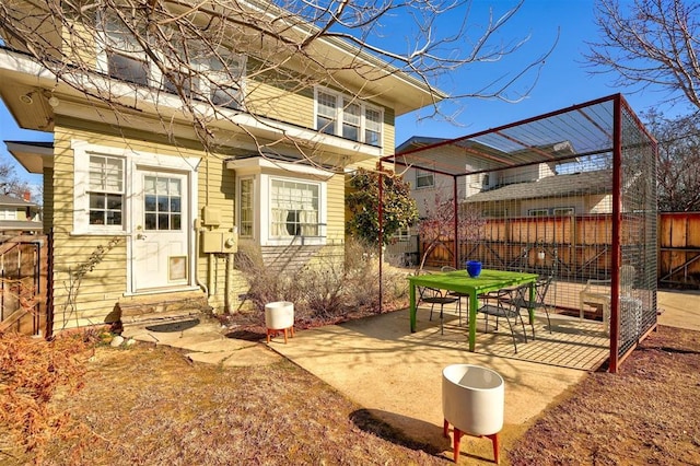 back of house with a patio area